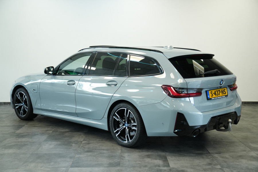 BMW 3 Serie Touring 320e Panoramadak PDC ACC HI-FI M Sport Trekhaak 24 Maanden garantie* (Vraag naar de voorwaarden)