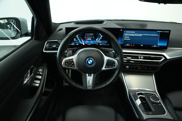 BMW 3 Serie Touring 320e Panoramadak PDC ACC HI-FI M Sport Trekhaak 24 Maanden garantie* (Vraag naar de voorwaarden)