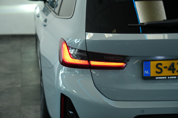BMW 3 Serie Touring 320e Panoramadak PDC ACC HI-FI M Sport Trekhaak 24 Maanden garantie* (Vraag naar de voorwaarden)