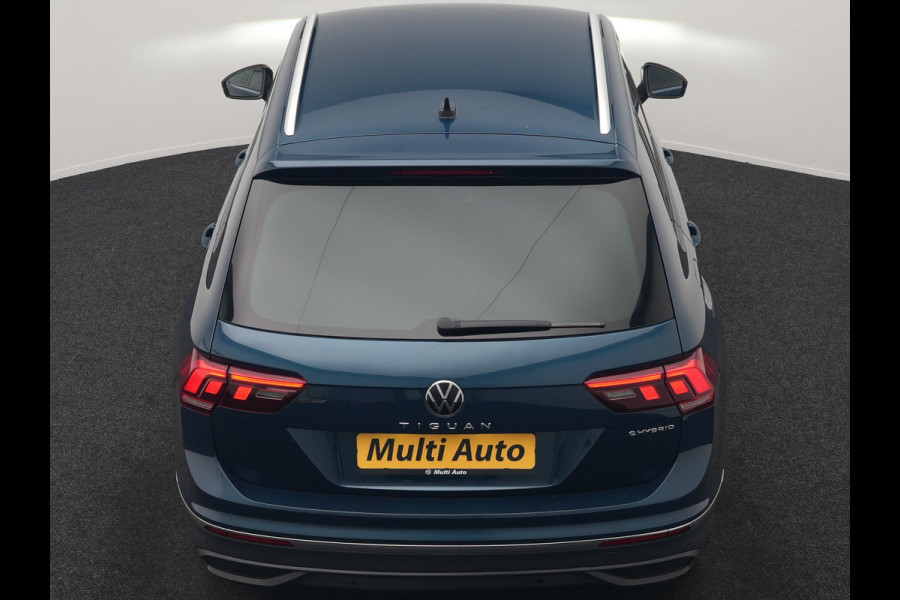 Volkswagen Tiguan 1.4 TSI eHybrid Active PHEV 245pk Dealer O.H. | Trekhaak Af Fabriek | Adaptive Cruise | Head Up | IQ Light | Keyless | Blis | Sportstoelen & Stuur Verwarmd | Sfeerverlichting | Apple Carplay | Navigate | DAB | 19"L.M | Plug In Hybrid |