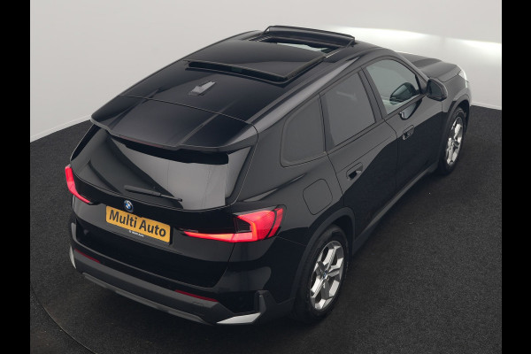 BMW iX1 xDrive30 67 kWh 313pk Dealer O.H. | Trekhaak Af Fabriek | Panodak | Adaptive Cruise | Head Up | 360 Camera | Harman / Kardon | Adaptief Onderstel | Lederen Sportstoelen Massage & Verwarmd | Stuur Verwarmd | Hifi Audio | Keyless | Blis |