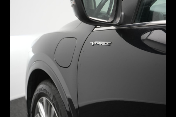 Ford Kuga 2.5 Vignale PHEV 225pk Dealer O.H. | Panodak | Head Up | Camera | Bang & Olufsen | Lederen Sportstoelen Memory & Verwarmd | Stuur Verwarmd | Keyless | Apple Carplay | Navigatie | DAB | Plug In Hybrid |