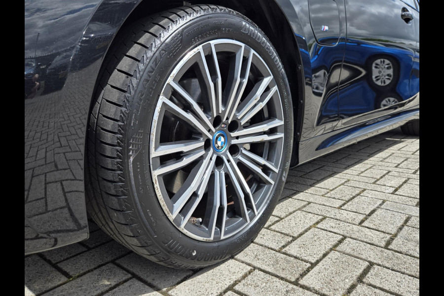 BMW 3 Serie Touring 320e Business Edition Plus NL-AUTO | LEDER | M-PAKKET| SOH 98%|