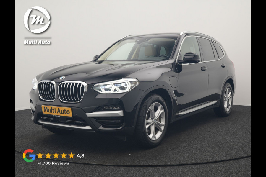 BMW X3 xDrive30e Business Edition Plus PHEV 293pk Dealer O.H. | Trekhaak Af Fabriek | Adaptive Cruise | 360 Camera | Adaptief Onderstel | Lederen Sportstoelen Memory & Ventilatie | Sfeerverlichting | Stoelen & Stuur Verwarmd | Keyless | Blis | Plug In Hybrid |