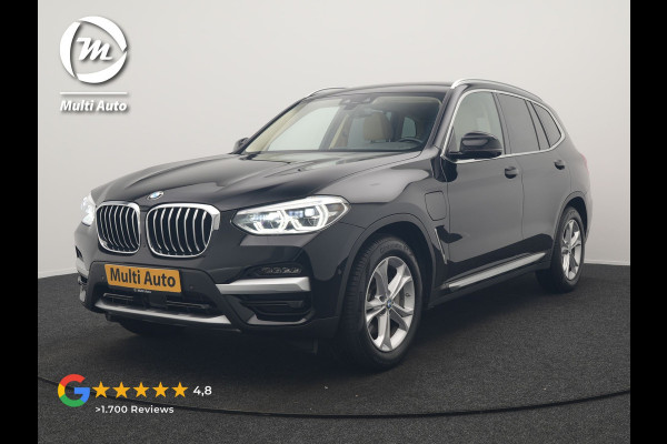 BMW X3 xDrive30e Business Edition Plus PHEV 293pk Dealer O.H. | Trekhaak Af Fabriek | Adaptive Cruise | 360 Camera | Adaptief Onderstel | Lederen Sportstoelen Memory & Ventilatie | Sfeerverlichting | Stoelen & Stuur Verwarmd | Keyless | Blis | Plug In Hybrid |