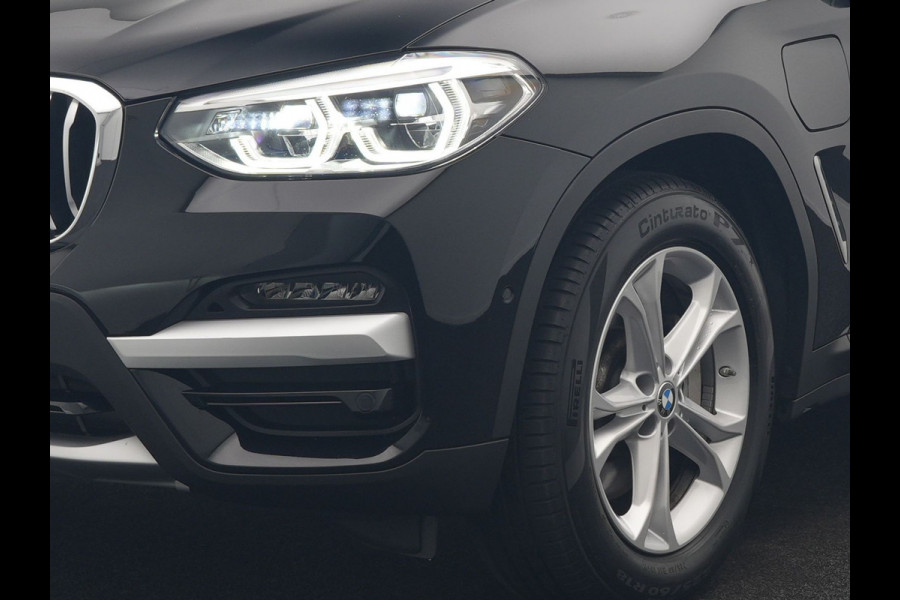 BMW X3 xDrive30e Business Edition Plus PHEV 293pk Dealer O.H. | Trekhaak Af Fabriek | Adaptive Cruise | 360 Camera | Adaptief Onderstel | Lederen Sportstoelen Memory & Ventilatie | Sfeerverlichting | Stoelen & Stuur Verwarmd | Keyless | Blis | Plug In Hybrid |