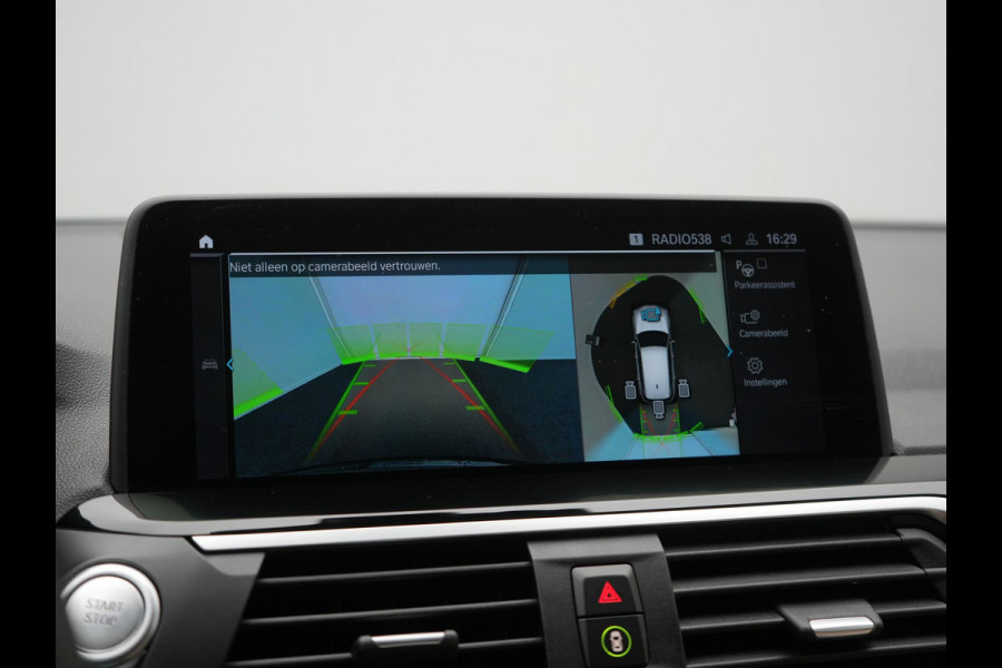 BMW X3 xDrive30e Business Edition Plus PHEV 293pk Dealer O.H. | Trekhaak Af Fabriek | Adaptive Cruise | 360 Camera | Adaptief Onderstel | Lederen Sportstoelen Memory & Ventilatie | Sfeerverlichting | Stoelen & Stuur Verwarmd | Keyless | Blis | Plug In Hybrid |