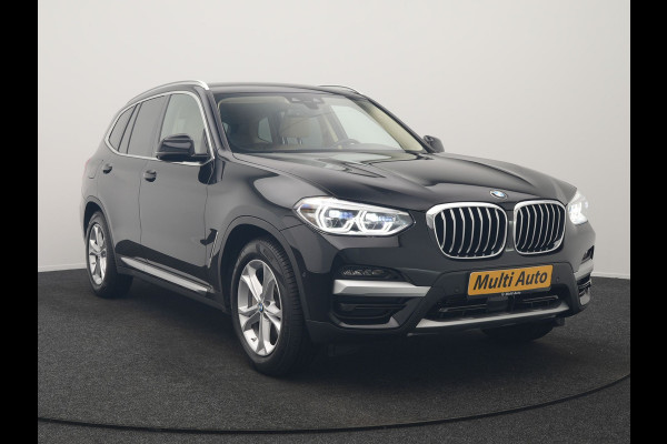 BMW X3 xDrive30e Business Edition Plus PHEV 293pk Dealer O.H. | Trekhaak Af Fabriek | Adaptive Cruise | 360 Camera | Adaptief Onderstel | Lederen Sportstoelen Memory & Ventilatie | Sfeerverlichting | Stoelen & Stuur Verwarmd | Keyless | Blis | Plug In Hybrid |