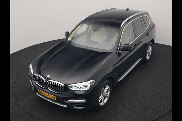 BMW X3 xDrive30e Business Edition Plus PHEV 293pk Dealer O.H. | Trekhaak Af Fabriek | Adaptive Cruise | 360 Camera | Adaptief Onderstel | Lederen Sportstoelen Memory & Ventilatie | Sfeerverlichting | Stoelen & Stuur Verwarmd | Keyless | Blis | Plug In Hybrid |