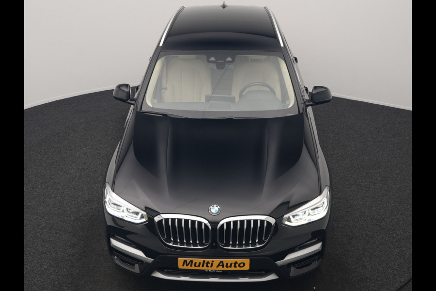 BMW X3 xDrive30e Business Edition Plus PHEV 293pk Dealer O.H. | Trekhaak Af Fabriek | Adaptive Cruise | 360 Camera | Adaptief Onderstel | Lederen Sportstoelen Memory & Ventilatie | Sfeerverlichting | Stoelen & Stuur Verwarmd | Keyless | Blis | Plug In Hybrid |