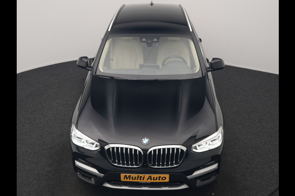 BMW X3 xDrive30e Business Edition Plus PHEV 293pk Dealer O.H. | Trekhaak Af Fabriek | Adaptive Cruise | 360 Camera | Adaptief Onderstel | Lederen Sportstoelen Memory & Ventilatie | Sfeerverlichting | Stoelen & Stuur Verwarmd | Keyless | Blis | Plug In Hybrid |