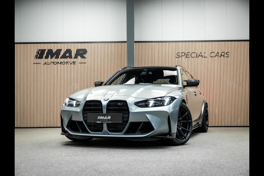 BMW 3 Serie Touring M3 xDrive Competition | Frozen Pure Grey II | WheelForce Velgen | Head-Up Display | Harman Kardon |