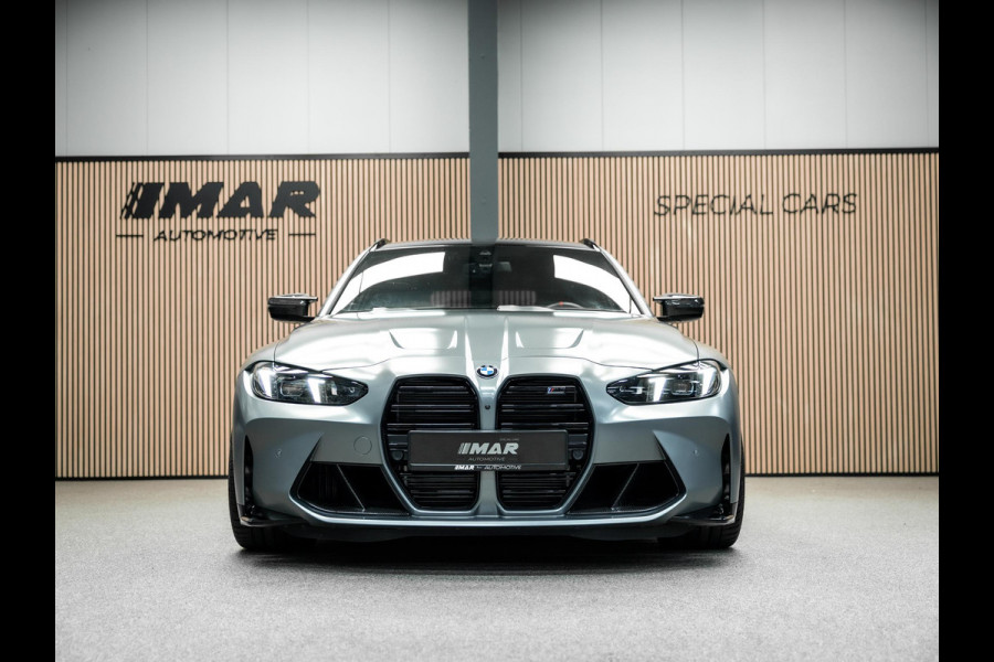BMW 3 Serie Touring M3 xDrive Competition | Frozen Pure Grey II | WheelForce Velgen | Head-Up Display | Harman Kardon |