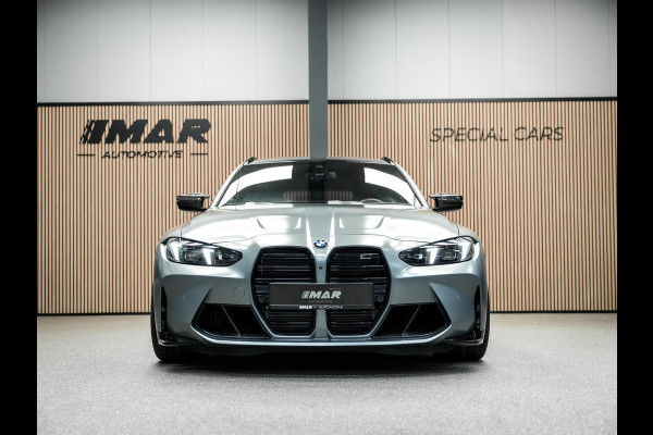BMW 3 Serie Touring M3 xDrive Competition | Frozen Pure Grey II | WheelForce Velgen | Head-Up Display | Harman Kardon |