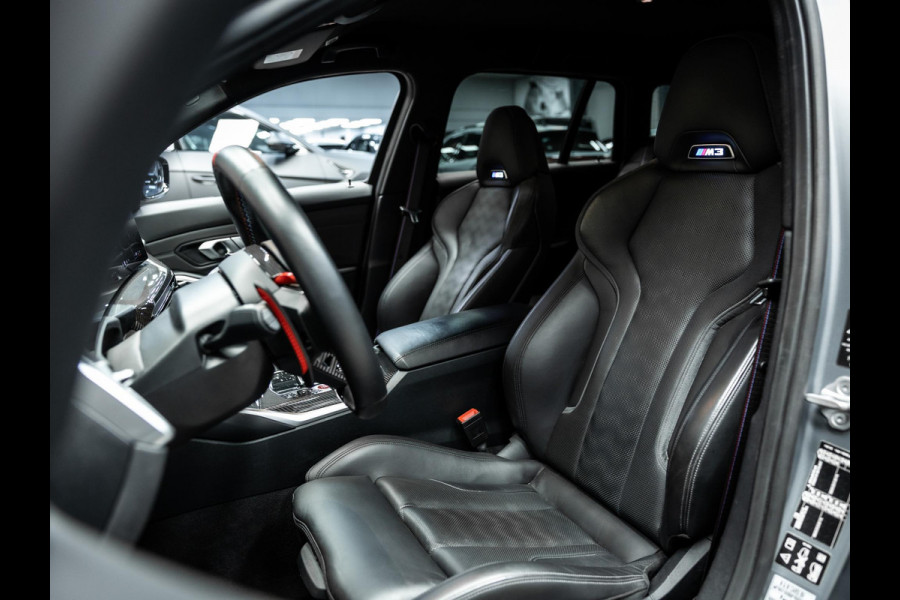BMW 3 Serie Touring M3 xDrive Competition | Frozen Pure Grey II | WheelForce Velgen | Head-Up Display | Harman Kardon |