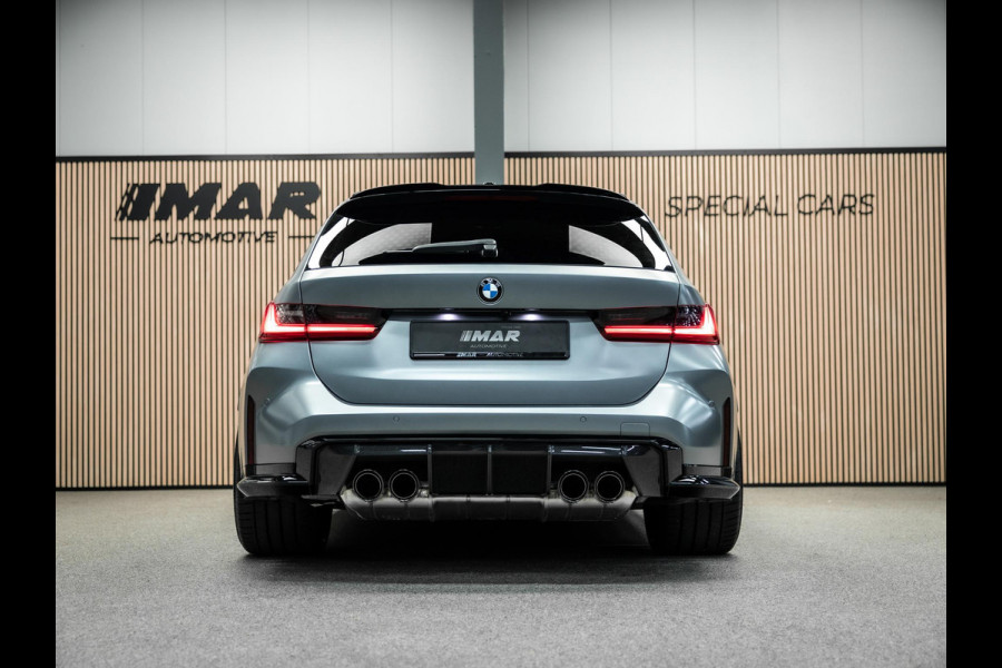 BMW 3 Serie Touring M3 xDrive Competition | Frozen Pure Grey II | WheelForce Velgen | Head-Up Display | Harman Kardon |