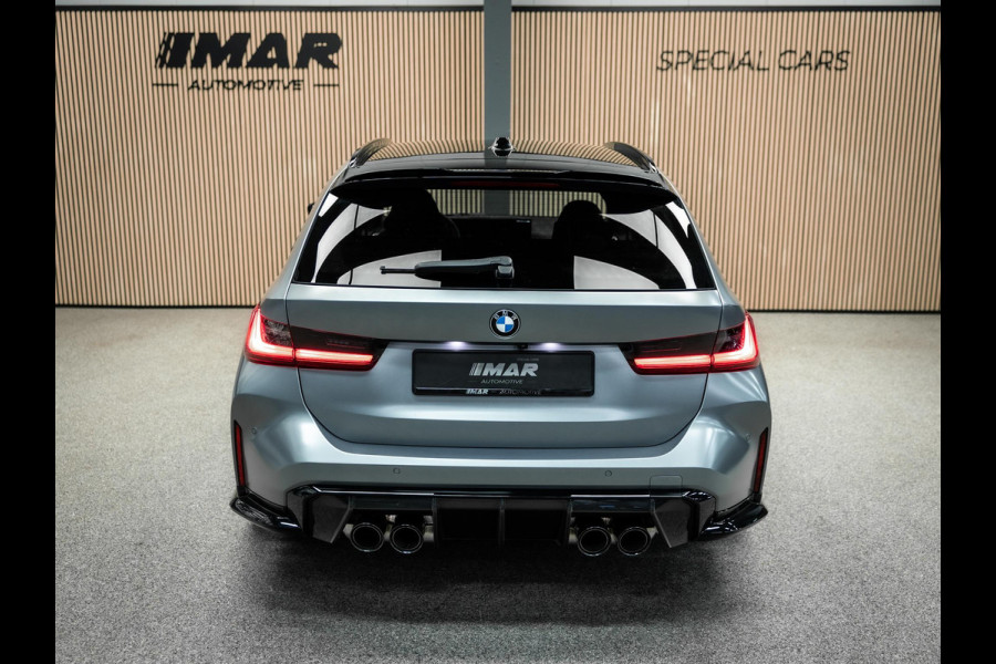 BMW 3 Serie Touring M3 xDrive Competition | Frozen Pure Grey II | WheelForce Velgen | Head-Up Display | Harman Kardon |
