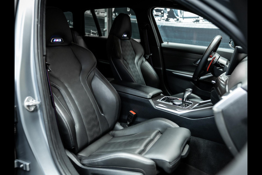 BMW 3 Serie Touring M3 xDrive Competition | Frozen Pure Grey II | WheelForce Velgen | Head-Up Display | Harman Kardon |