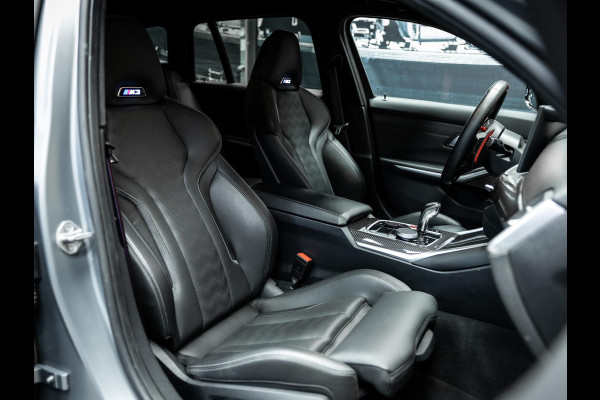 BMW 3 Serie Touring M3 xDrive Competition | Frozen Pure Grey II | WheelForce Velgen | Head-Up Display | Harman Kardon |