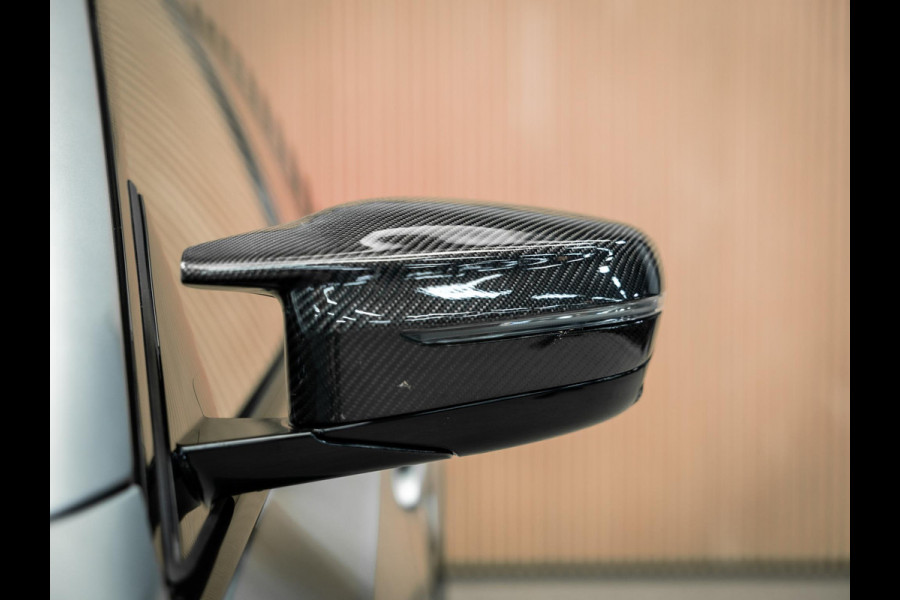 BMW 3 Serie Touring M3 xDrive Competition | Frozen Pure Grey II | WheelForce Velgen | Head-Up Display | Harman Kardon |