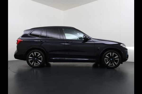 BMW iX3 Executive 80 kWh VAN: 44.900,- VOOR: 40.877,- UW WKVOORDEEL: 4.023,- | M-Sport |SOH 99% | ELEKTRISCHE TREKHAAK| ELEKTRISCHE ACHTERKLEP| PANORAMADAK| DRIVING ASSISTENT PROFESSIONAL| DODE HOEK SENSOR| STOELVERWARMING