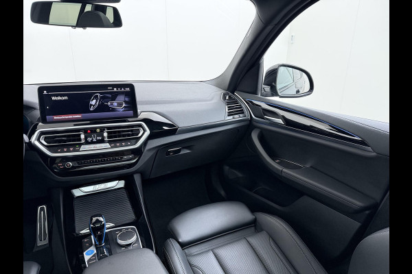 BMW iX3 Executive 80 kWh VAN: 44.900,- VOOR: 40.877,- UW WKVOORDEEL: 4.023,- | M-Sport |SOH 99% | ELEKTRISCHE TREKHAAK| ELEKTRISCHE ACHTERKLEP| PANORAMADAK| DRIVING ASSISTENT PROFESSIONAL| DODE HOEK SENSOR| STOELVERWARMING