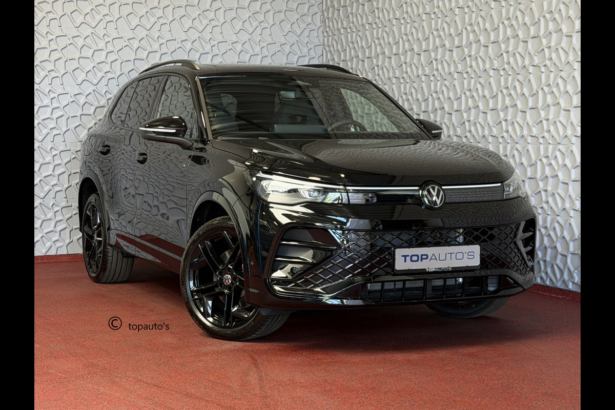 Volkswagen Tiguan 1.5 eHYBRID 272 PK NW AUTO R-LINE VW.TREKHAAK BLACK PANO XL.NAVI STOEL/STUUR VERW. BLACK.STYLE 360.CAM ELEK.KLEP MATRIX.LED 20'' PHEV PLUG IN HYBRID ✅Top Auto's Wijchen , 30 Jaar Specialist in Volkswagen  : Alle Type's : R-Line Edition / Style / First Edition / Highline / Life , Zowel PHEV / HEV / MHEV / Benzine ✅