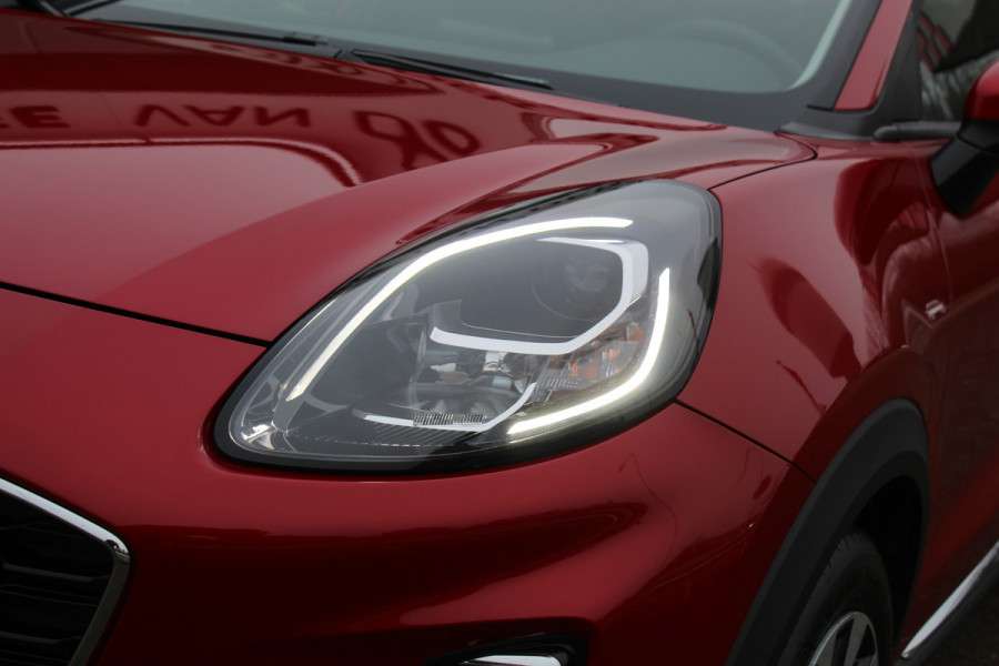 Ford Puma 1.0-125pk EcoBoost Mild-Hybrid Titanium. Fabrieksgarantie t/m 09-05-2027 ! Volautm. airco, stoel-, stuur- en voorraamverwarming, trekhaak, privacy glass, adaptive cruise cntrl, dodehoek assistent, camera, pdc v+a, rij-assistent pakket, winterpakket, metallic lak etc