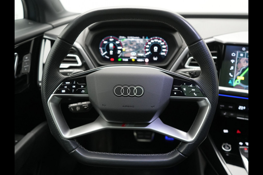 Audi Q4 e-tron 45 Quattro S Line 82 kWh 265pk Dealer O.H. | Trekhaak Af Fabriek | Panodak | Adaptive Cruise | Camera | Sportstoelen Memory & Verwarmd | Sfeerverlichting | Keyless | Navigatie | DAB |