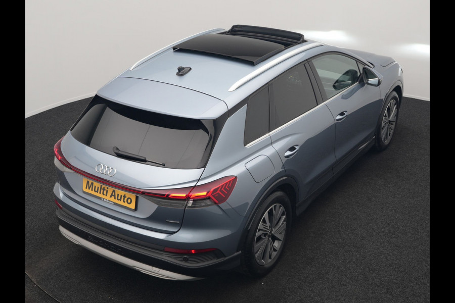 Audi Q4 e-tron 45 Quattro S Line 82 kWh 265pk Dealer O.H. | Trekhaak Af Fabriek | Panodak | Adaptive Cruise | Camera | Sportstoelen Memory & Verwarmd | Sfeerverlichting | Keyless | Navigatie | DAB |