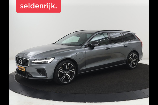 Volvo V60 2.0 T8 Twin Engine AWD R-Design | Trekhaak | Stoelverwarming | Carplay | Sportstoelen | Half leder | Navigatie | Camera | Side Assist | 19'' velgen | Full LED | Standkachel | Cruise control | PHEV | Plug In