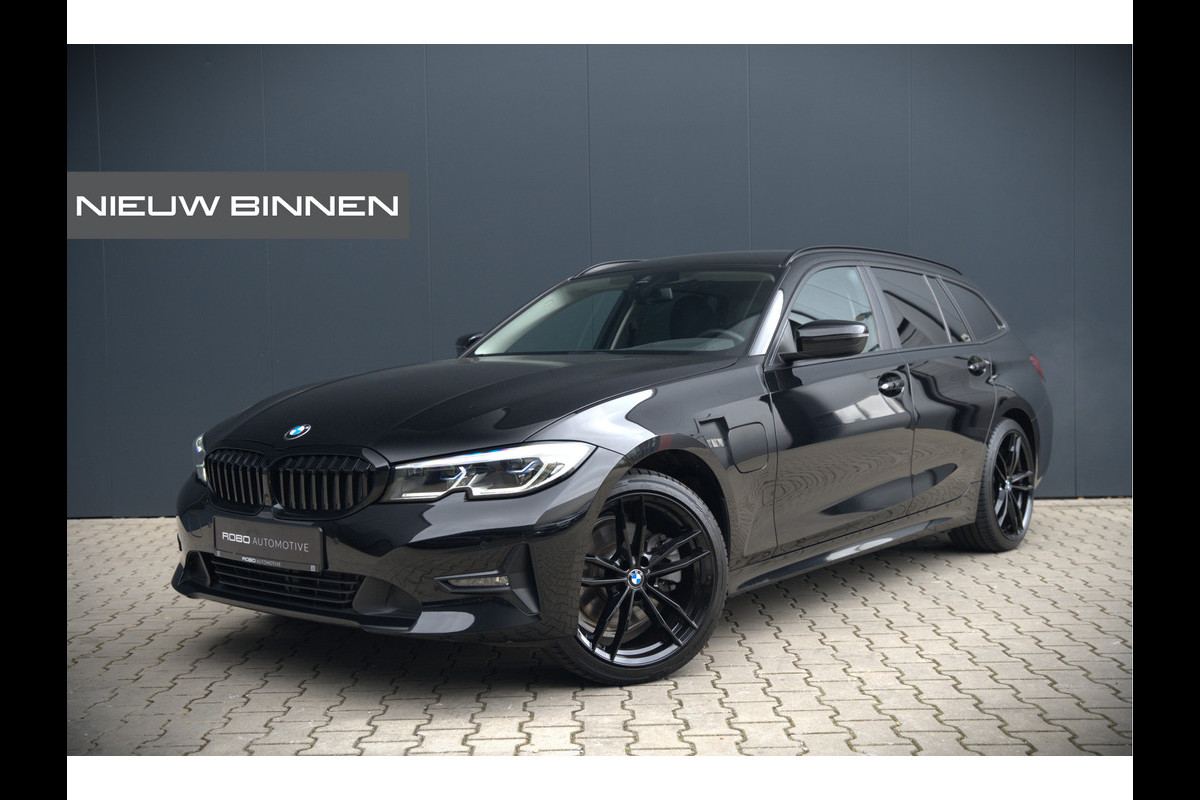 BMW 3 Serie Touring 320e Business Edition Plus | Stoelverwarming | Cruise Control | Apple Carplay | Navigatie | Laser Light | HIFI | Parkeersensoren | Grootlichtassistent | DAB |
