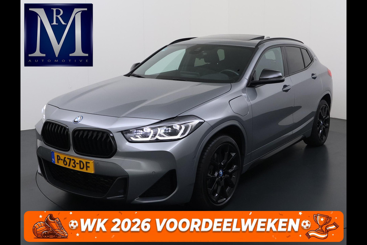 BMW X2 xDrive25e M SPORT Business Edition Plus VAN: 31.900,- VOOR: 29.330,- UW WKVOORDEEL: 2.570,- | BOMVOL | PHEV| PANO| NAP| STOEL + STUURVERWARMING| COMFORT ACCESS| ELEK. ACHTERKLEP| AFNEEMBARE TREKHAAK| HUD| ACHTERUITRIJCAMERA| APPLE CARPLAY