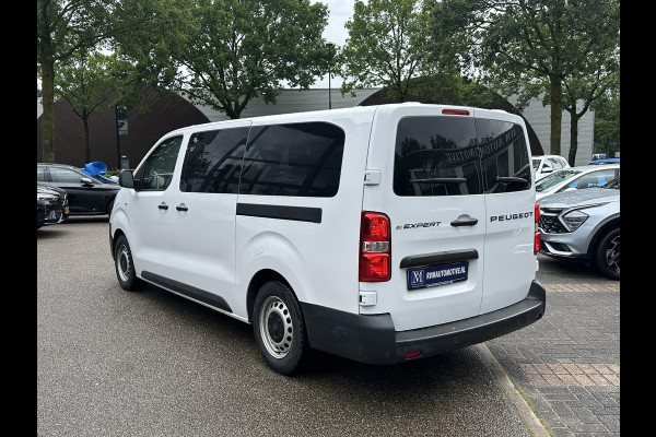 Peugeot e-Expert Standard 75 kWh SOH 97% |9 ZITPLAATSEN PRIJS INCL. BTW | ACHTERUITRIJCAMERA| FABRIEKSGARANTIE PEUGEOT| NAVIGATIE| SCHUIFDEUREN LINKS + RECHTS| CARPLAY|