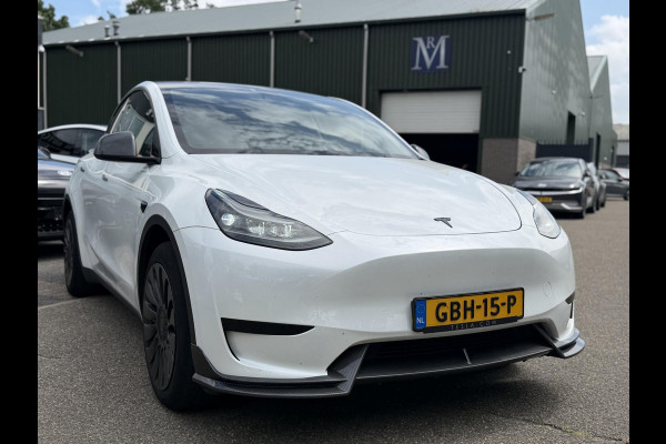 Tesla Model Y RWD 58 kWh UNIEK!| |VAN €35.900:,- VOOR: 32.877,- UW WKVOORDEEL: 3.023,- | STOEL + STUURWIELVERWARMING l CARBON PAKKET | TESLA FABRIEKSGARANTIE  9-2027 OF TOT 80.000 KM |