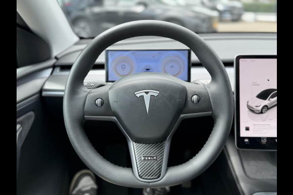 Tesla Model Y RWD 58 kWh UNIEK!| |VAN €35.900:,- VOOR: 32.877,- UW WKVOORDEEL: 3.023,- | STOEL + STUURWIELVERWARMING l CARBON PAKKET | TESLA FABRIEKSGARANTIE  9-2027 OF TOT 80.000 KM |