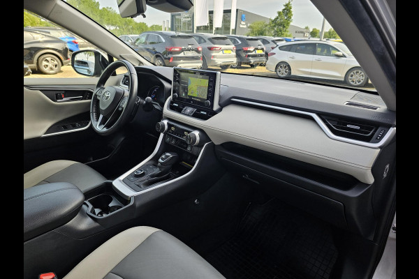 Toyota RAV4 2.5 Hybrid AWD Bi-Tone 220 pk | Trekhaak | Leder | Schuif-kanteldak | JBL geluid | Stoelverwarming | Camera etc.