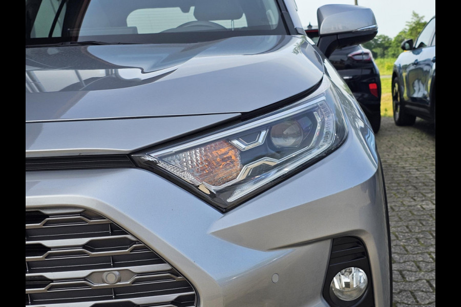 Toyota RAV4 2.5 Hybrid AWD Bi-Tone 220 pk | Trekhaak | Leder | Schuif-kanteldak | JBL geluid | Stoelverwarming | Camera etc.