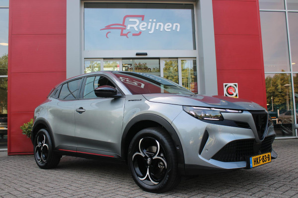 Alfa Romeo junior 1.2 Turbo 145PK Hybrid IBRIDA SPECIALE | TECHNO PACK: LEX MATRIX KOPLAMPEN/AUTOMATISCH DIMMENDE BINNENSPIEGEL/DRAADLOZE TELEFOONLADER/DODEHOEK DETECTIE/ELEKTRISCH BEDIENBARE ACHTERKLEP/KEYLESS ENTRY EN START/ADAPTIVE CRUISE CONTROL/ACHTERUITRIJ CAMERA | VOORRUIT VERWARMING | ELEKTRISCH BEDIENBARE BESTUURDERSSTOEL MET MASSAGE FUNCTIE | PARKEERSENSOREN VOOR + ACHTER | STOEL VERWARMING | CLIMATE CONTROL | DRAADLOZE APPLE CARPLAY/ANDROID AUTO | NAVIGATIE | 18" LICHTMETALEN VELGEN |