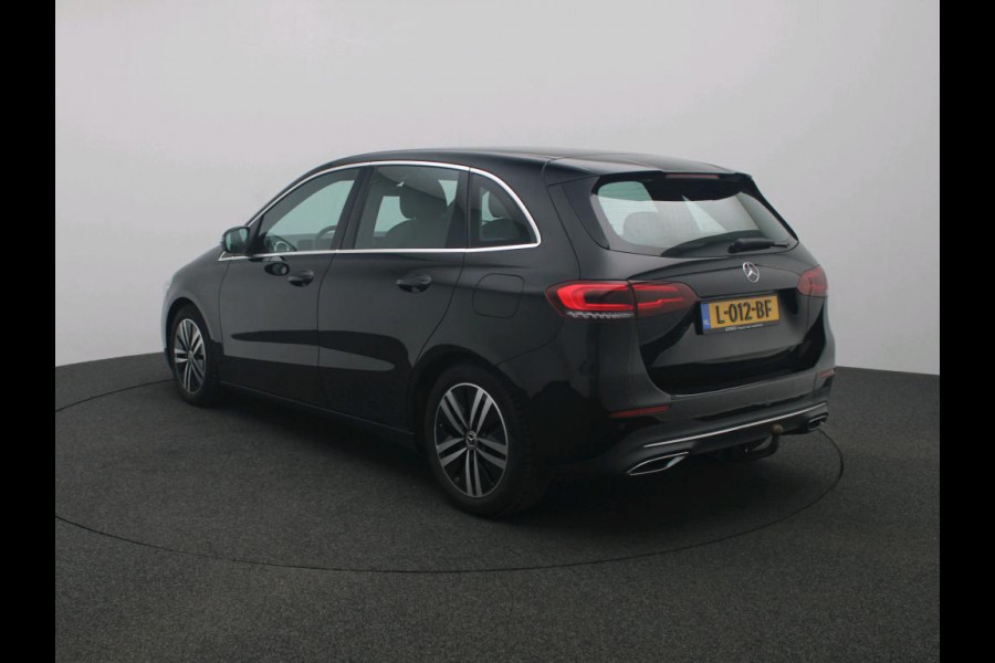 Mercedes-Benz B-Klasse 180 Business Solution Luxury Trekhaak | Parkeerpakket met achteruitrijcamera | Ledkoplampen | Sfeerverlichting | Stoelverwarming. Inclusief 24 maanden MB Certified garantie voor Europa.
