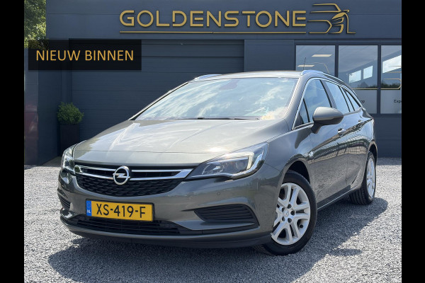 Opel Astra Sports Tourer 1.0 Turbo Business+ 2e Eigenaar,Carplay,Navi,Trekhaak,Dealer Onderhouden,Lm velgen,Pdc,N.A.P,105pk,Clima,Cruise,Recent beurt gehad,Apk tot 03-2027