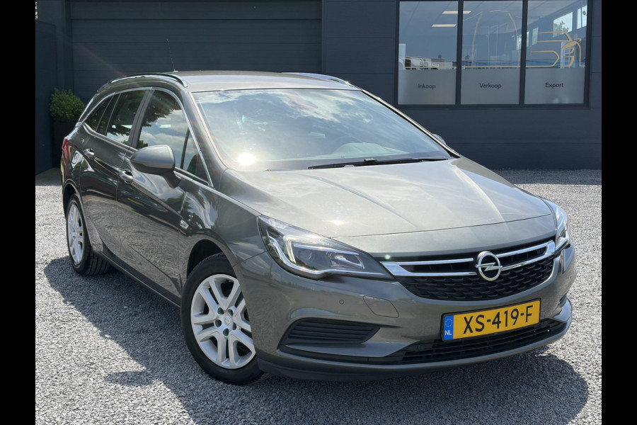 Opel Astra Sports Tourer 1.0 Turbo Business+ 2e Eigenaar,Carplay,Navi,Trekhaak,Dealer Onderhouden,Lm velgen,Pdc,N.A.P,105pk,Clima,Cruise,Recent beurt gehad,Apk tot 03-2027
