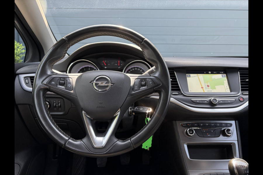 Opel Astra Sports Tourer 1.0 Turbo Business+ 2e Eigenaar,Carplay,Navi,Trekhaak,Dealer Onderhouden,Lm velgen,Pdc,N.A.P,105pk,Clima,Cruise,Recent beurt gehad,Apk tot 03-2027