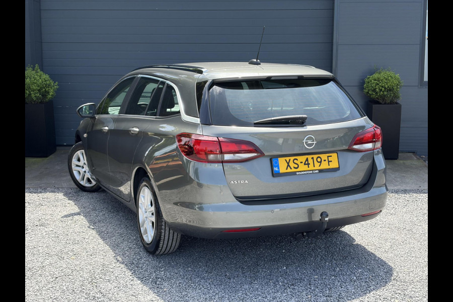 Opel Astra Sports Tourer 1.0 Turbo Business+ 2e Eigenaar,Carplay,Navi,Trekhaak,Dealer Onderhouden,Lm velgen,Pdc,N.A.P,105pk,Clima,Cruise,Recent beurt gehad,Apk tot 03-2027