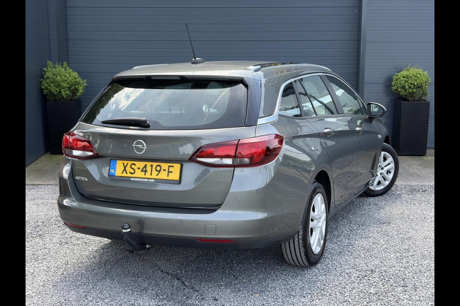 Opel Astra Sports Tourer 1.0 Turbo Business+ 2e Eigenaar,Carplay,Navi,Trekhaak,Dealer Onderhouden,Lm velgen,Pdc,N.A.P,105pk,Clima,Cruise,Recent beurt gehad,Apk tot 03-2027