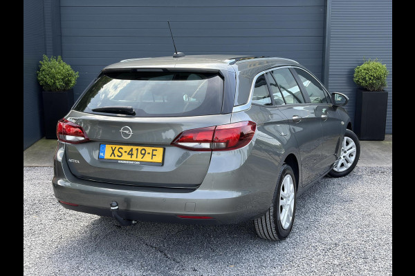 Opel Astra Sports Tourer 1.0 Turbo Business+ 2e Eigenaar,Carplay,Navi,Trekhaak,Dealer Onderhouden,Lm velgen,Pdc,N.A.P,105pk,Clima,Cruise,Recent beurt gehad,Apk tot 03-2027