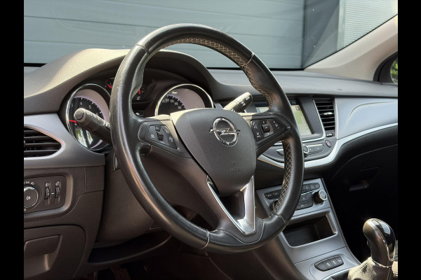 Opel Astra Sports Tourer 1.0 Turbo Business+ 2e Eigenaar,Carplay,Navi,Trekhaak,Dealer Onderhouden,Lm velgen,Pdc,N.A.P,105pk,Clima,Cruise,Recent beurt gehad,Apk tot 03-2027