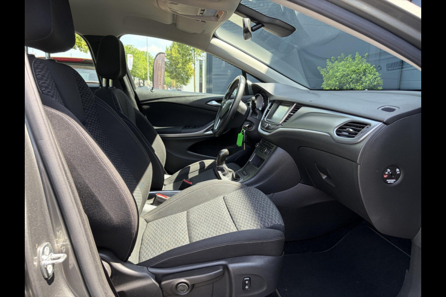 Opel Astra Sports Tourer 1.0 Turbo Business+ 2e Eigenaar,Carplay,Navi,Trekhaak,Dealer Onderhouden,Lm velgen,Pdc,N.A.P,105pk,Clima,Cruise,Recent beurt gehad,Apk tot 03-2027