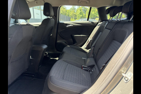 Opel Astra Sports Tourer 1.0 Turbo Business+ 2e Eigenaar,Carplay,Navi,Trekhaak,Dealer Onderhouden,Lm velgen,Pdc,N.A.P,105pk,Clima,Cruise,Recent beurt gehad,Apk tot 03-2027