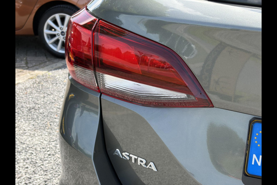 Opel Astra Sports Tourer 1.0 Turbo Business+ 2e Eigenaar,Carplay,Navi,Trekhaak,Dealer Onderhouden,Lm velgen,Pdc,N.A.P,105pk,Clima,Cruise,Recent beurt gehad,Apk tot 03-2027